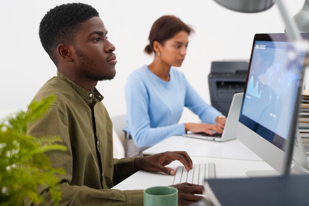 people sitting at computer